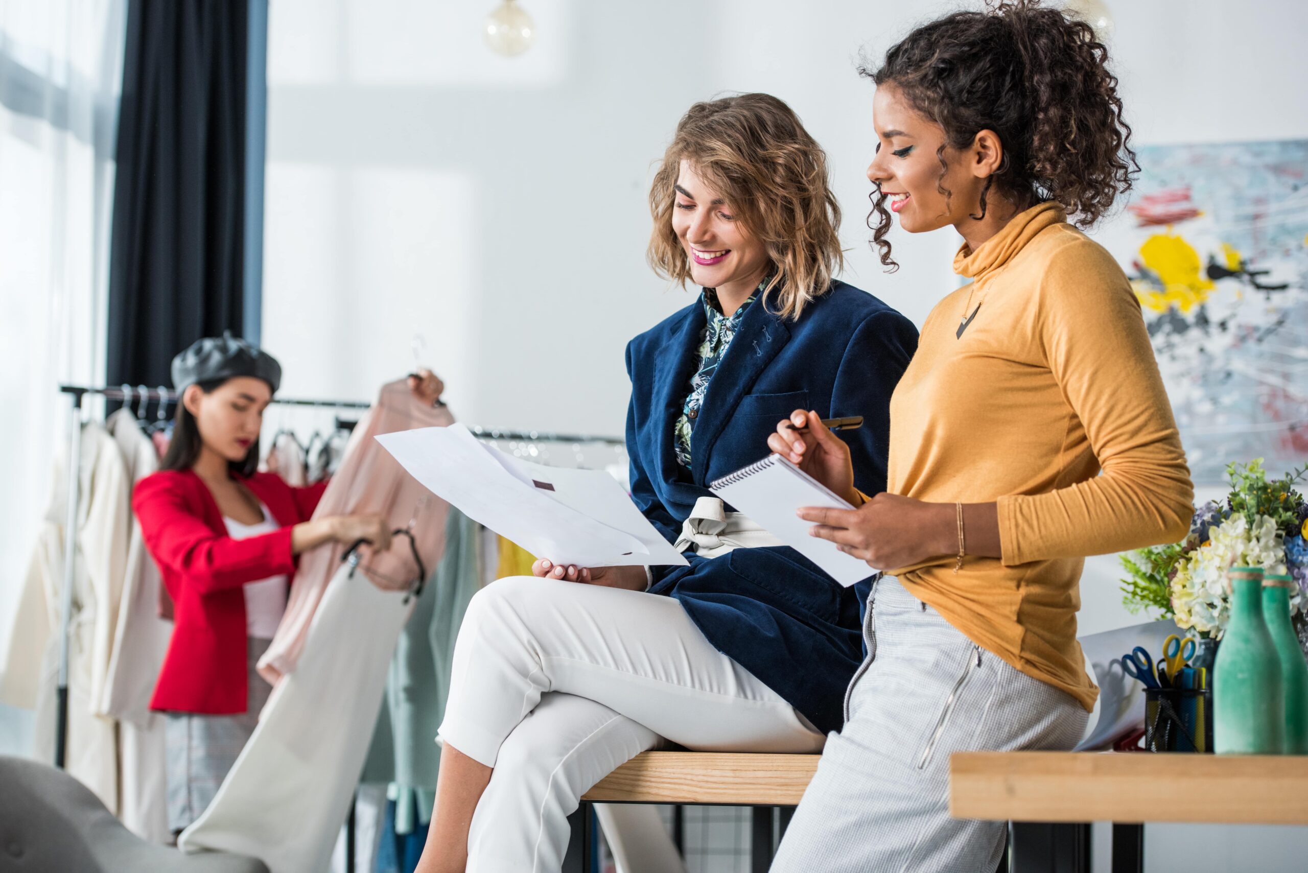 Designers helping Impact Promos promote businesses